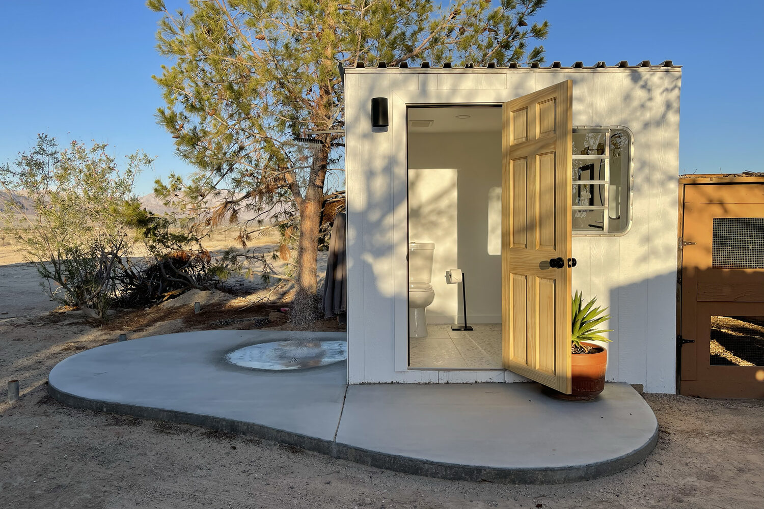 Inside the shed, now a finished bathhouse with an outdoor shower